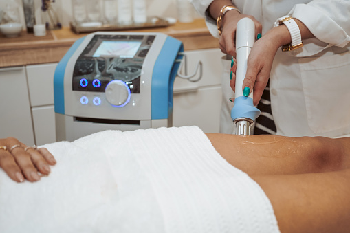 Woman getting cosmetic procedures at beauty center